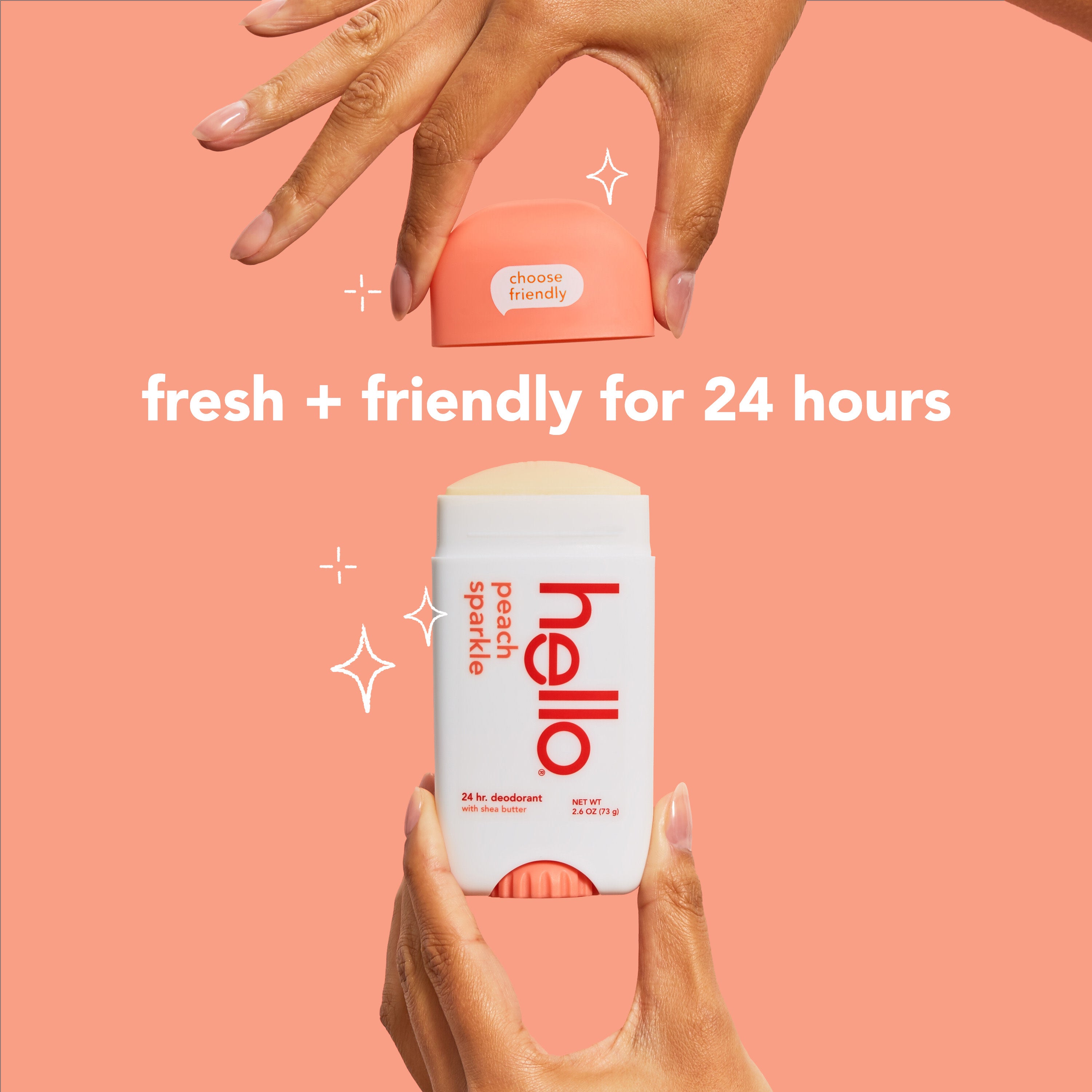 A hand holding up a stick of hello peach sparkle aluminum free deodorant with shea butter. In text: fresh + friendly for 24 hours.