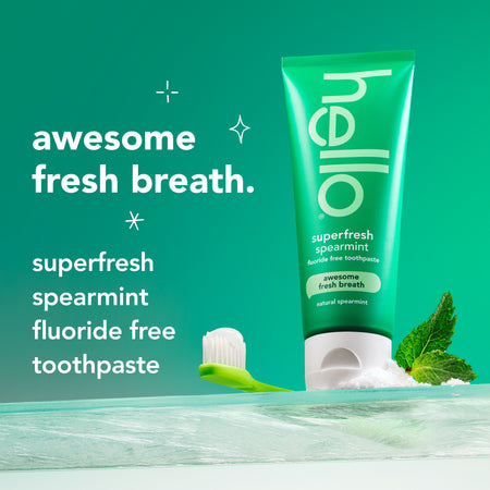 a tube of hello Superfresh Spearmint Fluoride Free Toothpaste. In text: Awesome fresh breath. Superfresh spearment fluoride free toothpaste